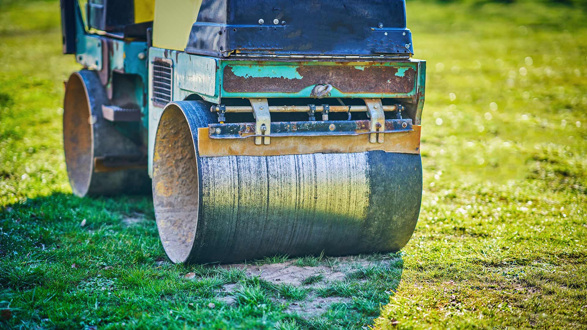 How often to roll a grass tennis court