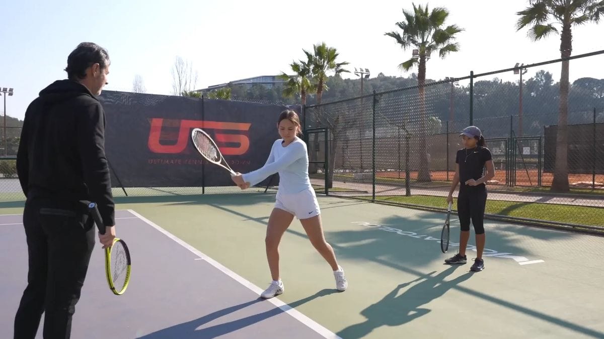 Player demonstrating backhand without ball